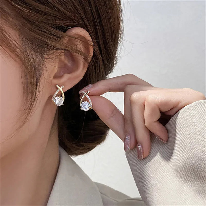 SKEDS Cross Stud Earrings™