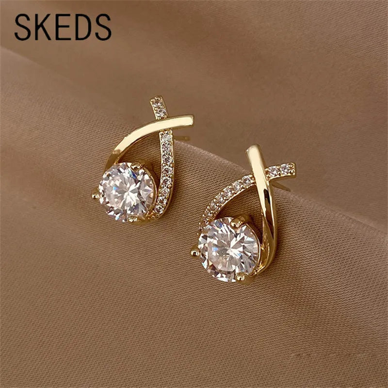 SKEDS Cross Stud Earrings™